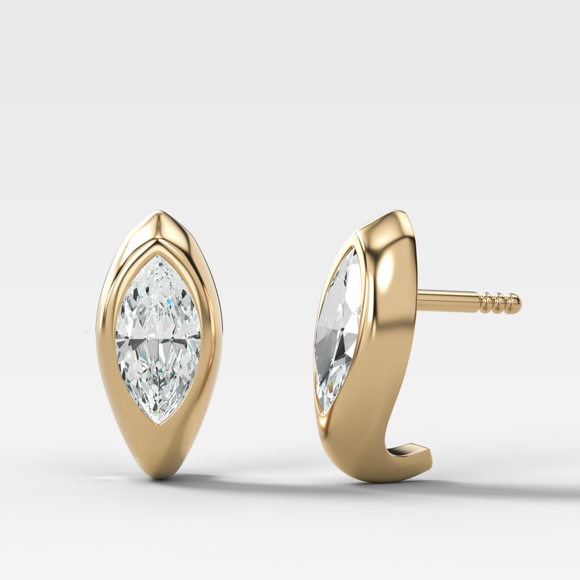 Sculpted Bezel Studs with Marquise Cut Diamonds