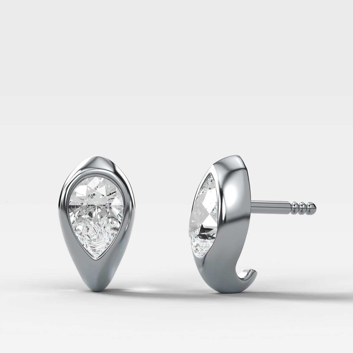 Sculpted Bezel Studs with Pear Cut Diamonds
