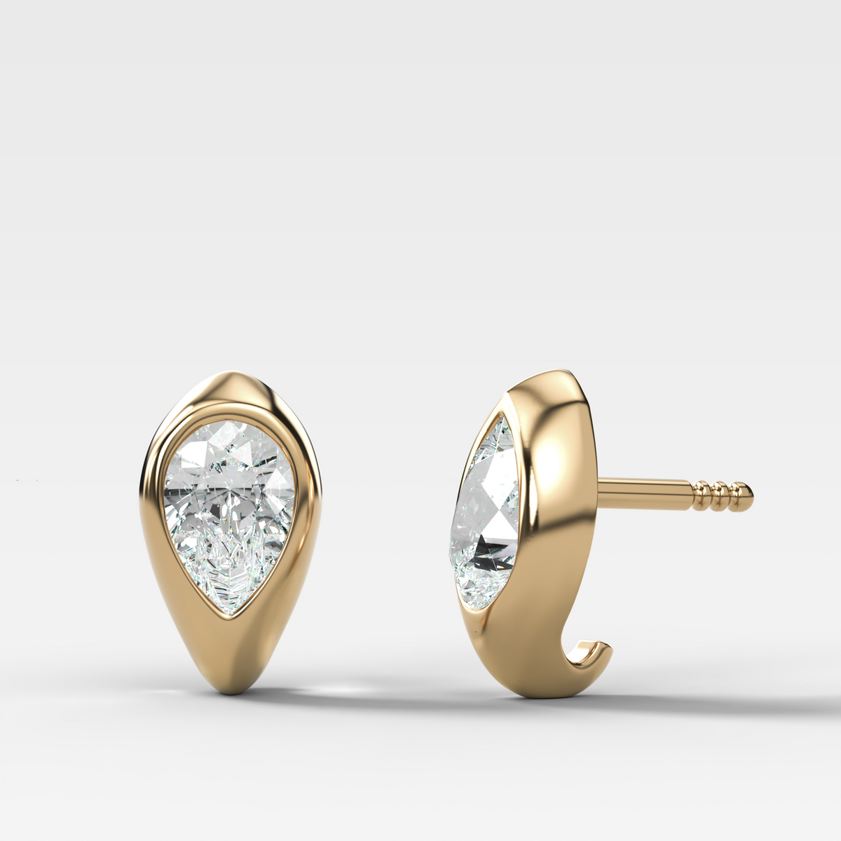 Sculpted Bezel Studs with Pear Cut Diamonds