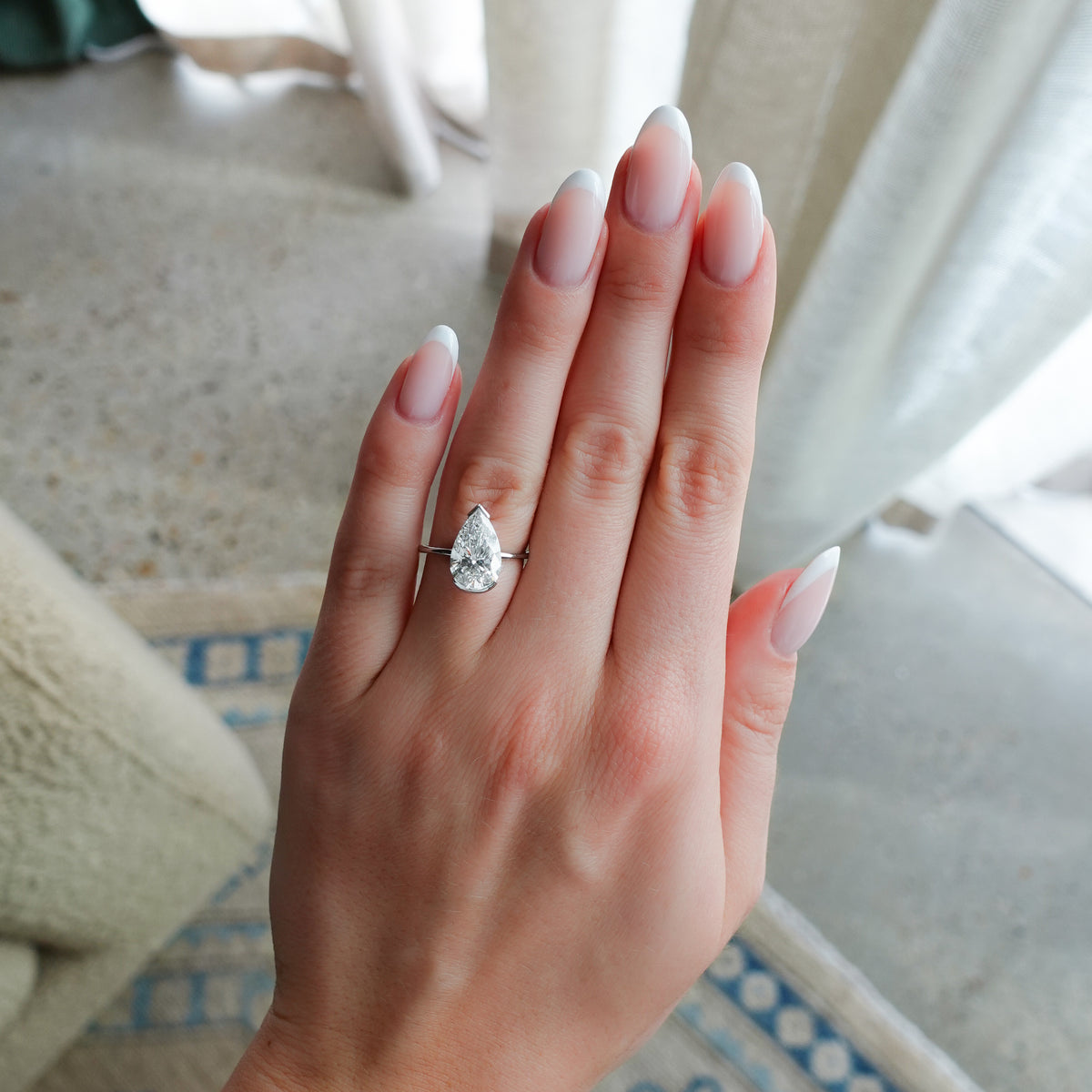 North South Half Bezel Solitaire Engagement Ring With Lab Grown 3.27ct Pear Cut Diamond