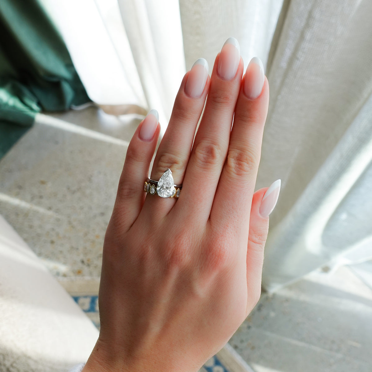 North South Half Bezel Solitaire Engagement Ring With Pear Cut Diamond