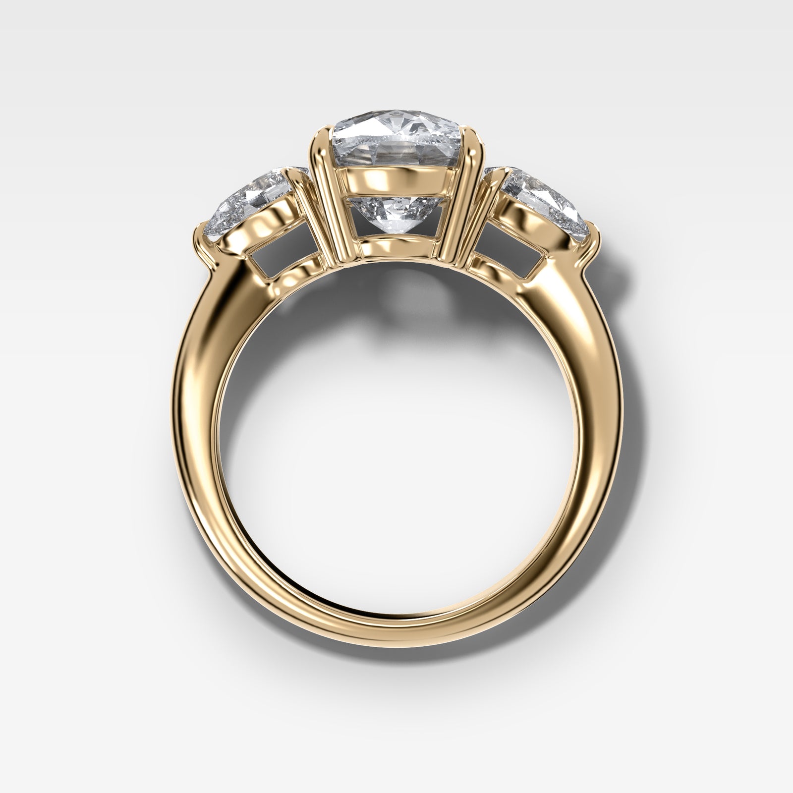 Three Stone Engagement Ring With Pear Side Stones and Elongated Cushion Cut by Good Stone in Yellow Gold