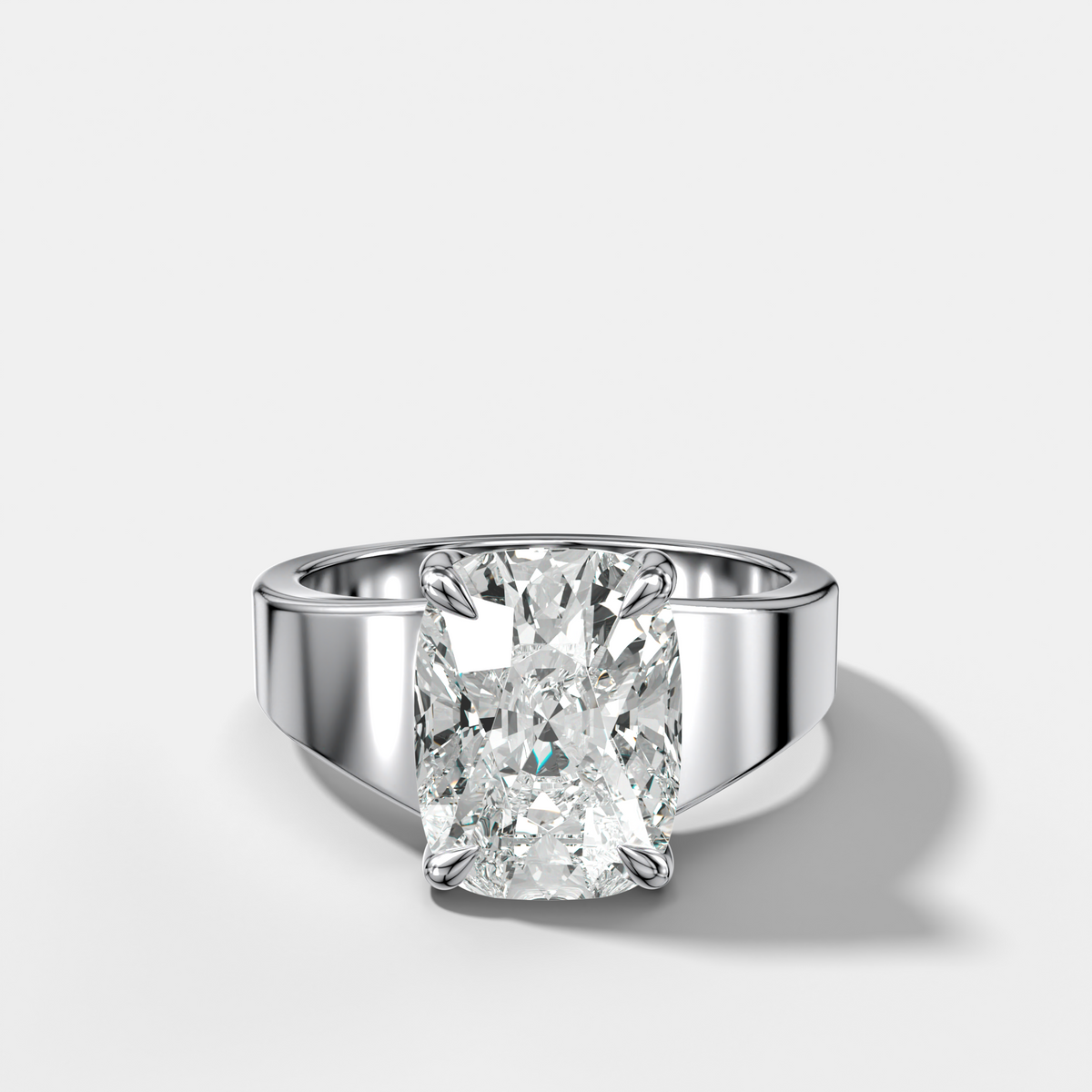Finest Tapered Engagement Ring With Elongated Cushion Cut Diamond