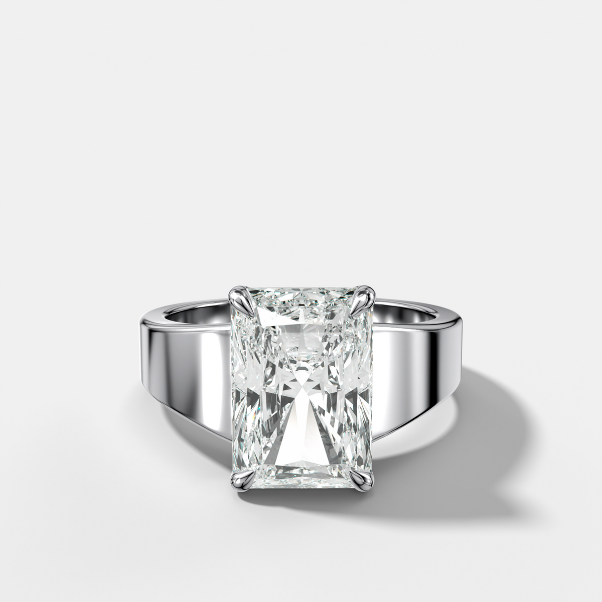 Finest Tapered Engagement Ring With Elongated Radiant Cut Diamond