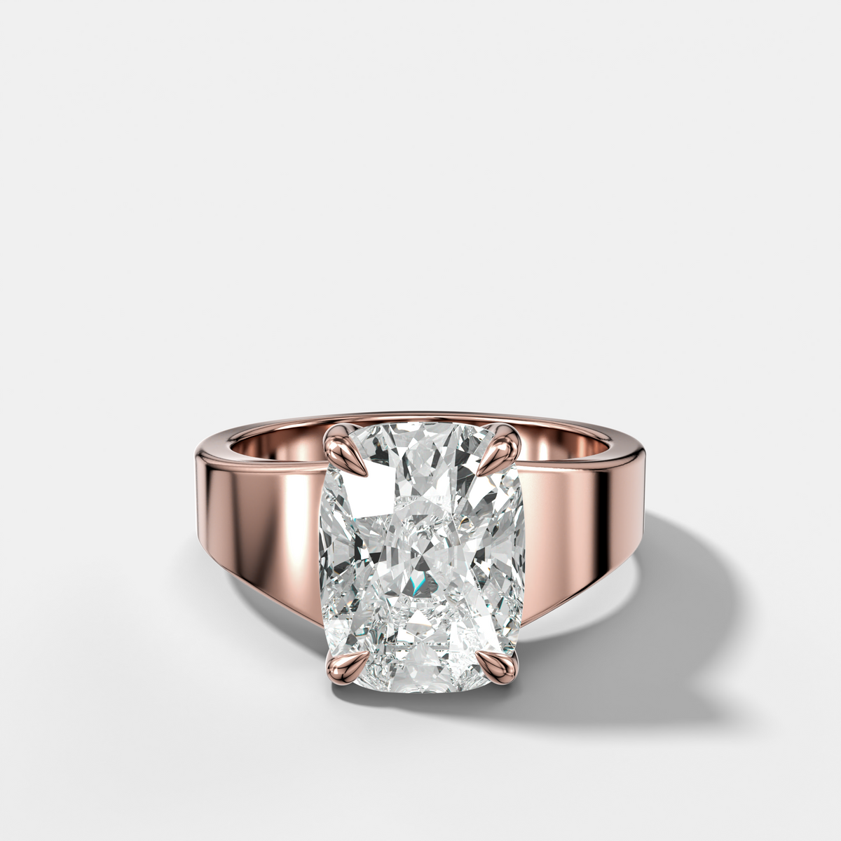 Finest Tapered Engagement Ring With Elongated Cushion Cut Diamond