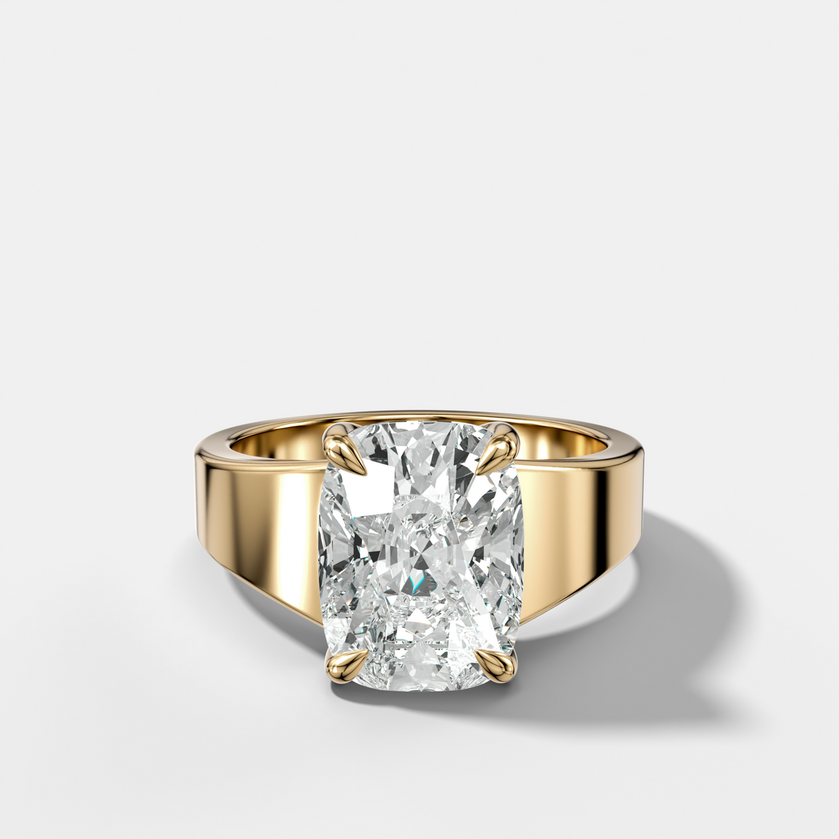 Finest Tapered Engagement Ring With Elongated Cushion Cut Diamond