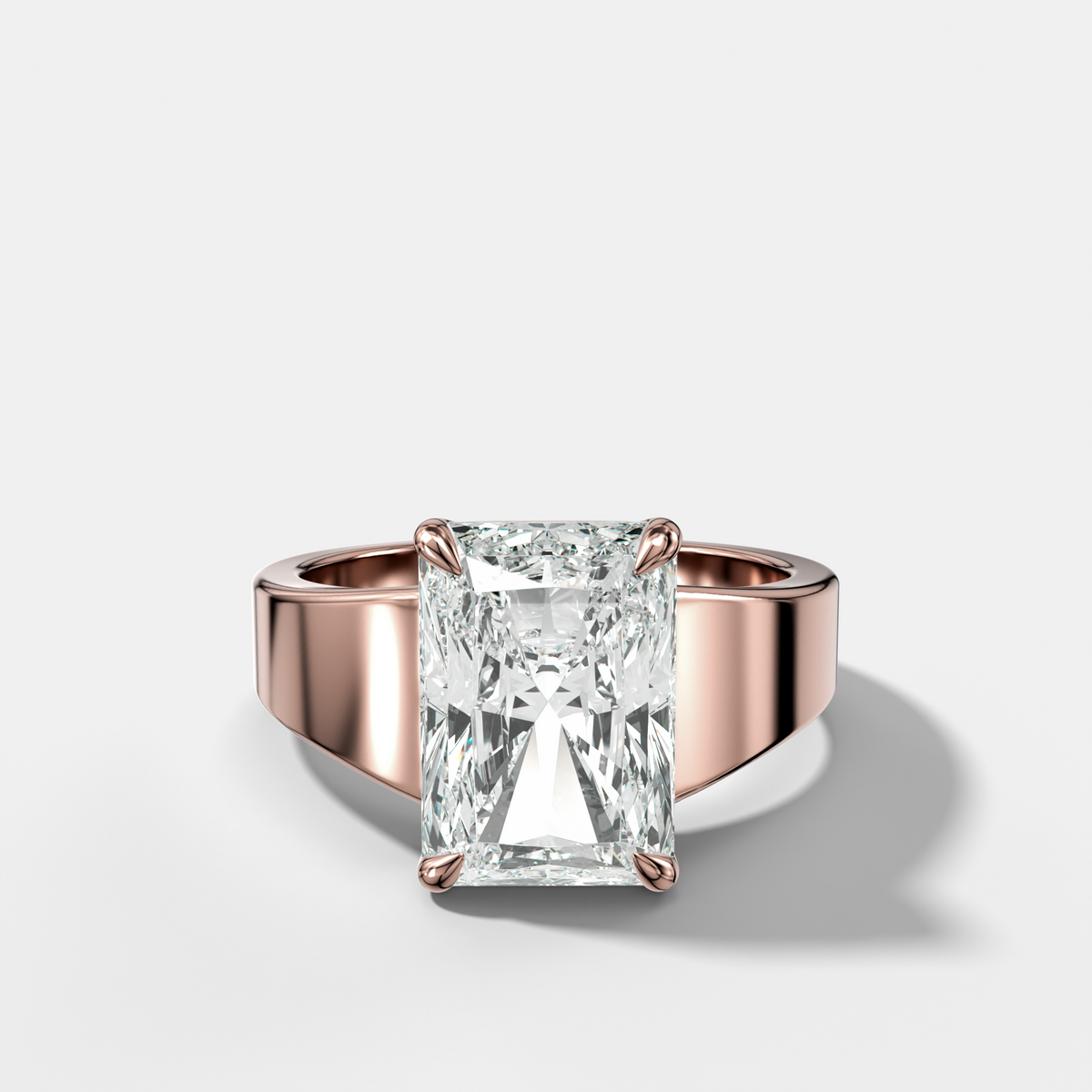 Finest Tapered Engagement Ring With Elongated Radiant Cut Diamond