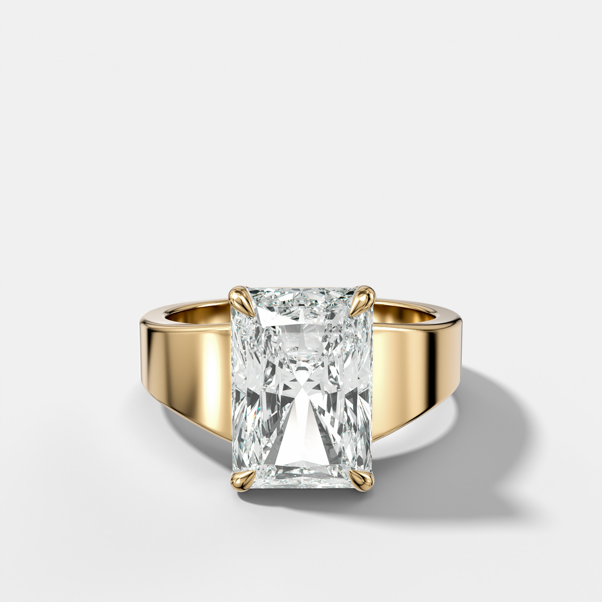Finest Tapered Engagement Ring With Elongated Radiant Cut Diamond