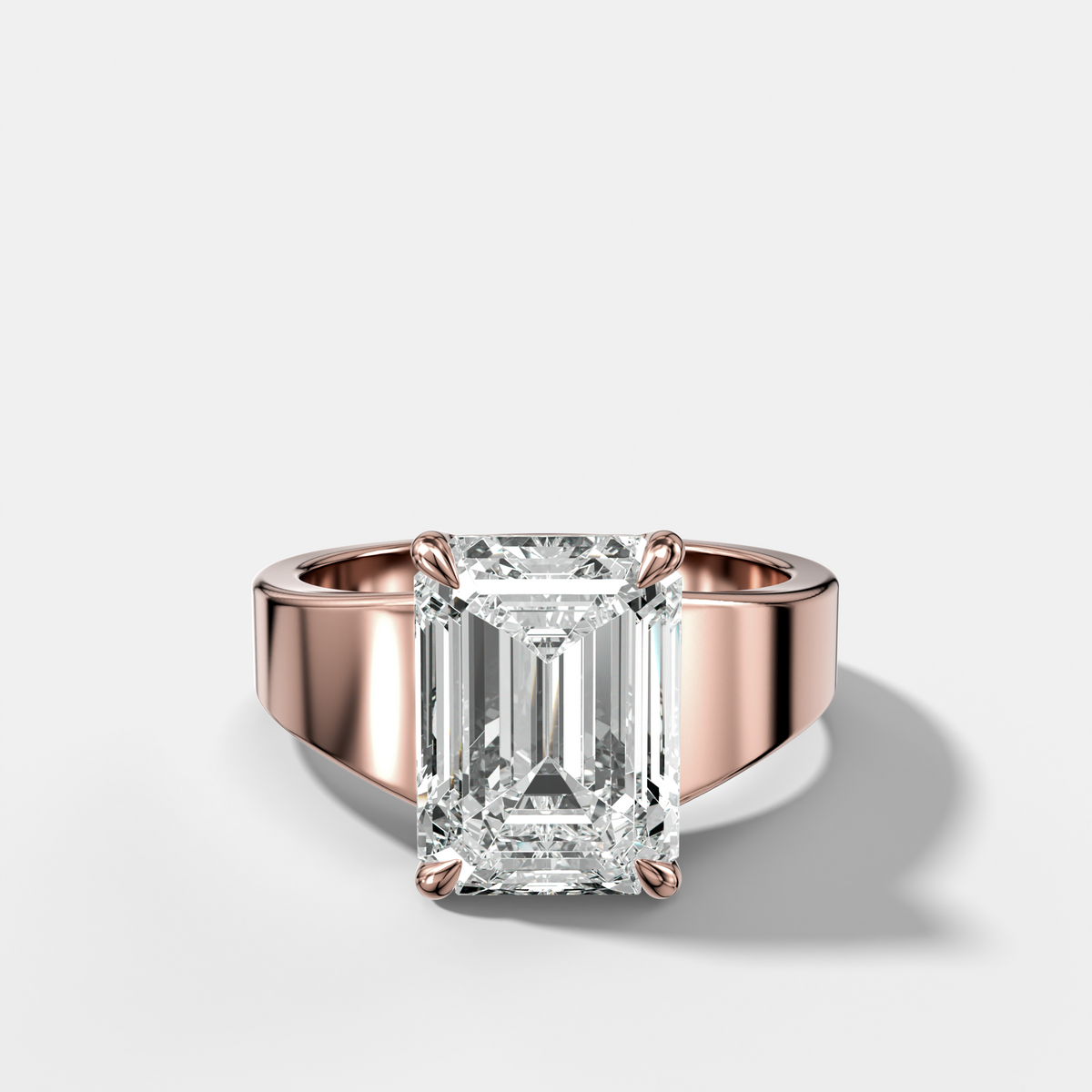 Finest Tapered Engagement Ring With Emerald Cut Diamond