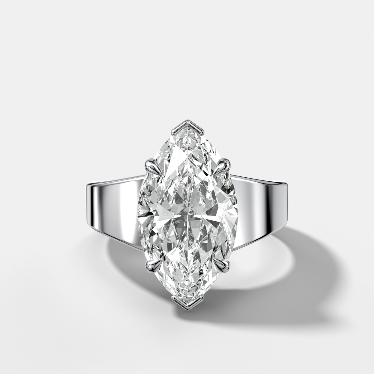 Finest Tapered Engagement Ring With Marquise Cut Diamond