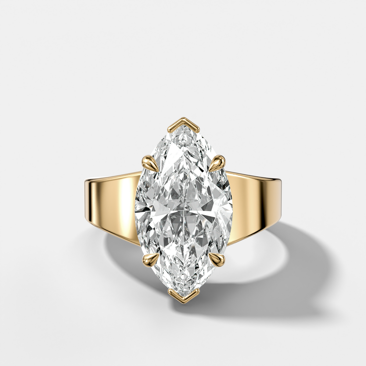 Finest Tapered Engagement Ring With Marquise Cut Diamond