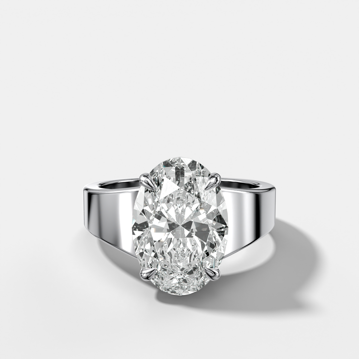Finest Tapered Engagement Ring With Oval Cut Diamond