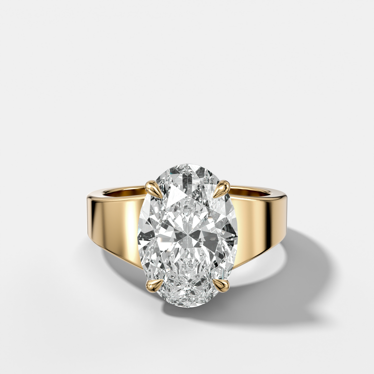 Finest Tapered Engagement Ring With Oval Cut Diamond