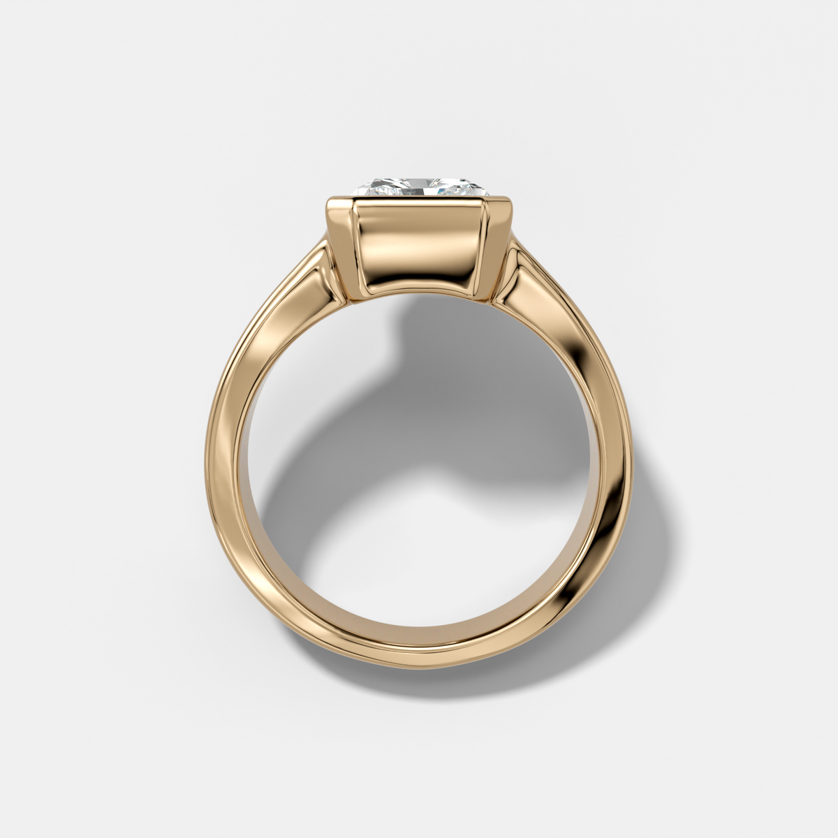 Finest Tapered Bezel Set Engagement Ring With Elongated Radiant Cut Diamond