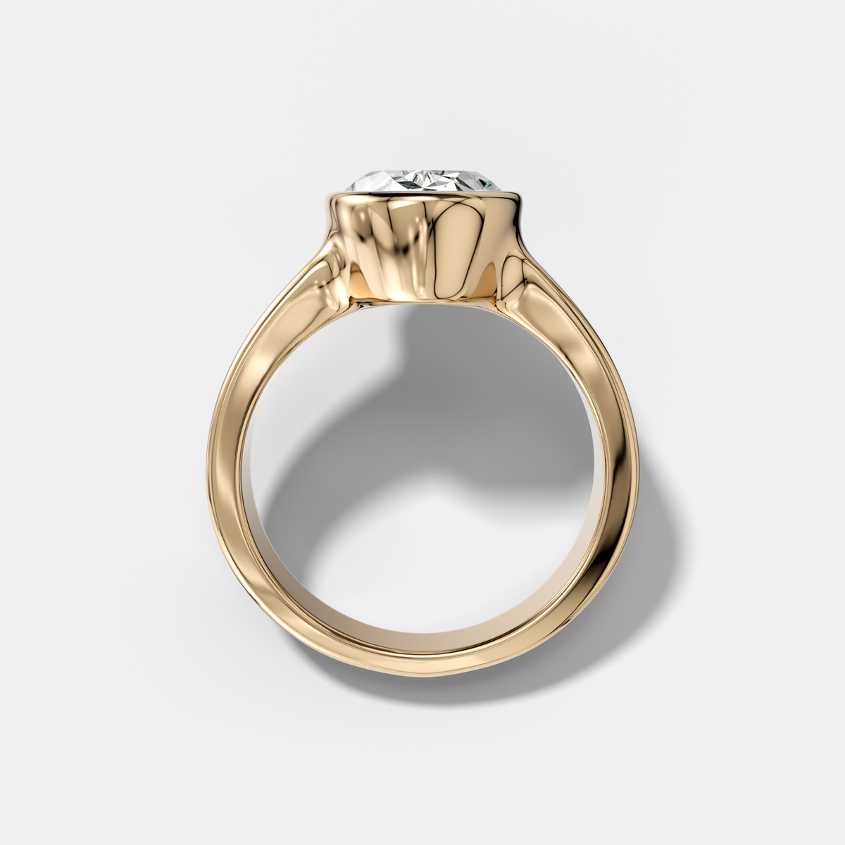 Finest Tapered Bezel Set Engagement Ring With Oval Cut Diamond