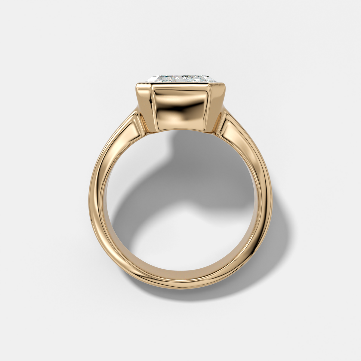 Finest Tapered Bezel Set Engagement Ring With Emerald Cut Diamond