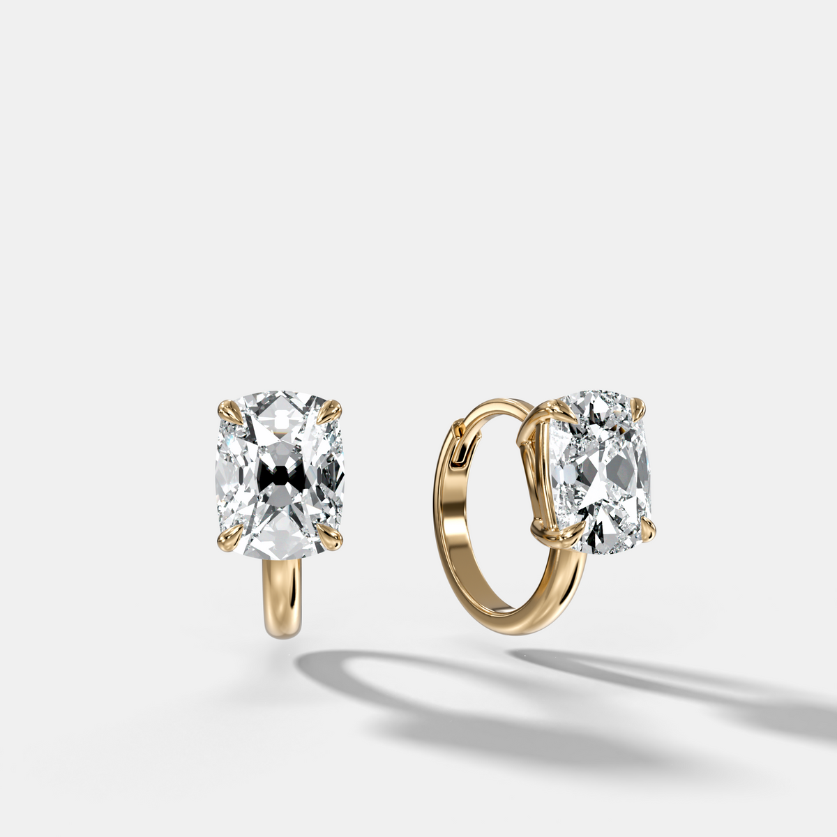 Floating Huggie with Elongated Old Mine Cut Diamonds