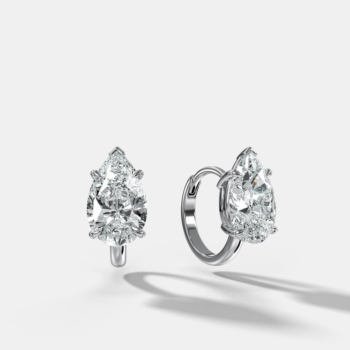 Floating Huggie with Pear Cut Diamonds