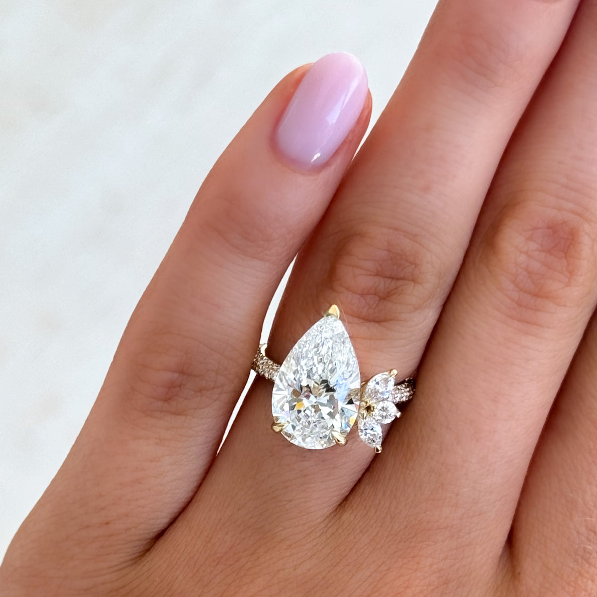 Lotus Triple Row Pavé Engagement Ring With Pear Cut Diamond