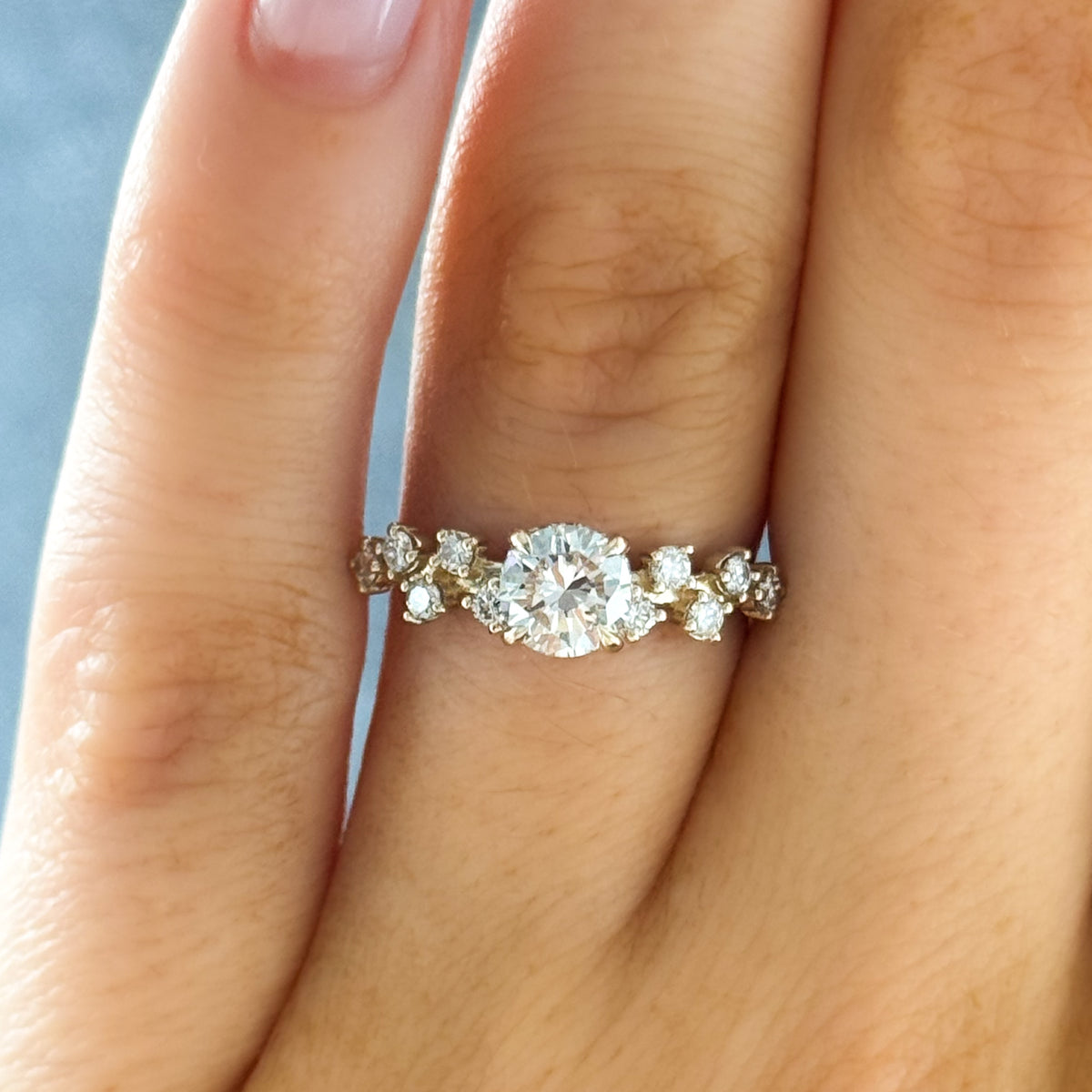 Starfire Engagement Ring with Round Cut Diamond