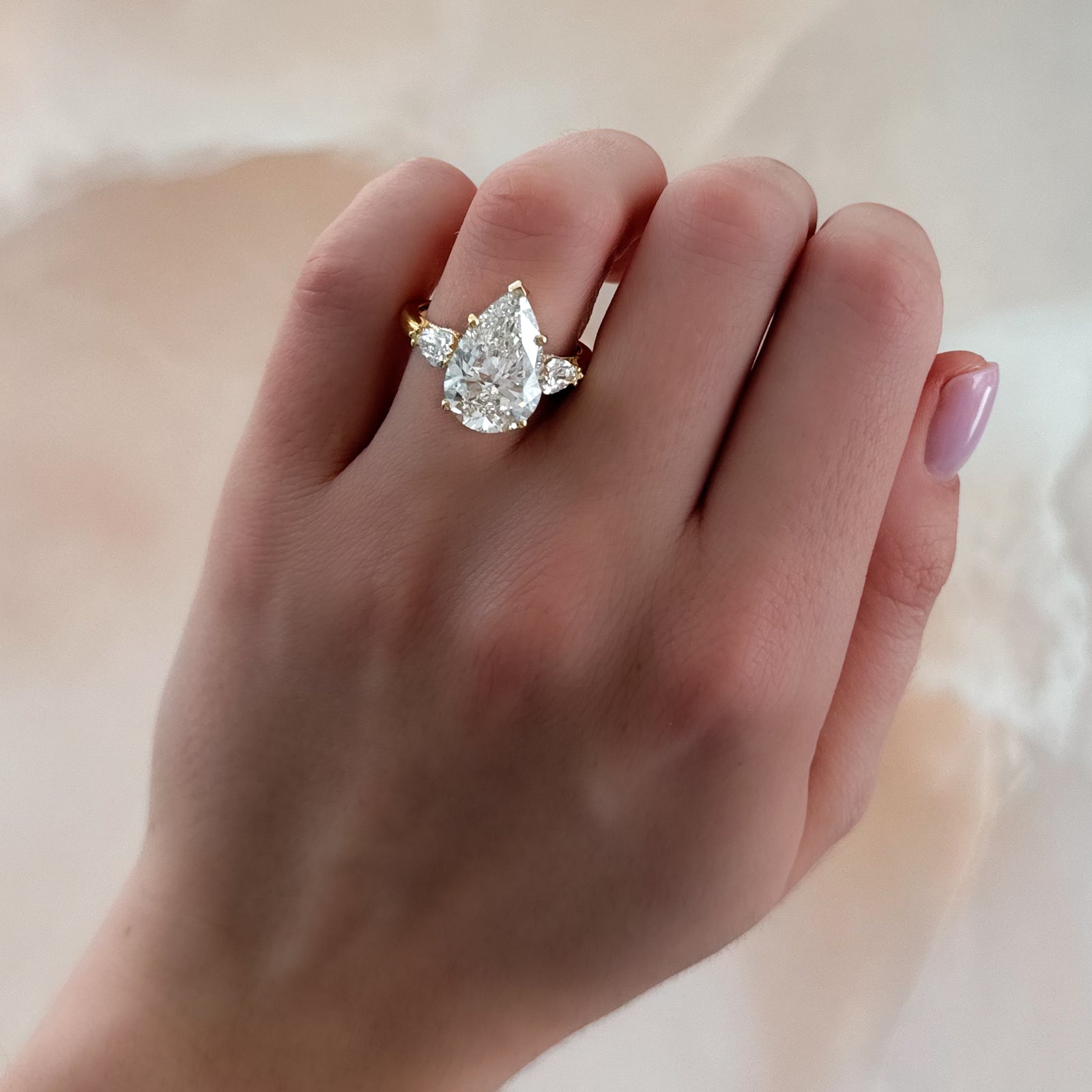 Three Stone Engagement Ring With Pear Side Stones and Pear Cut by Good Stone in Yellow Gold