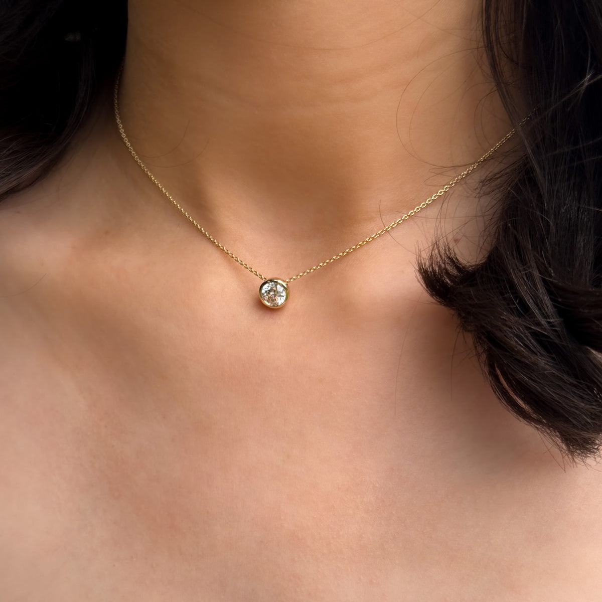 Bezel Pendant Necklace with a 0.98ct Round Cut Diamond