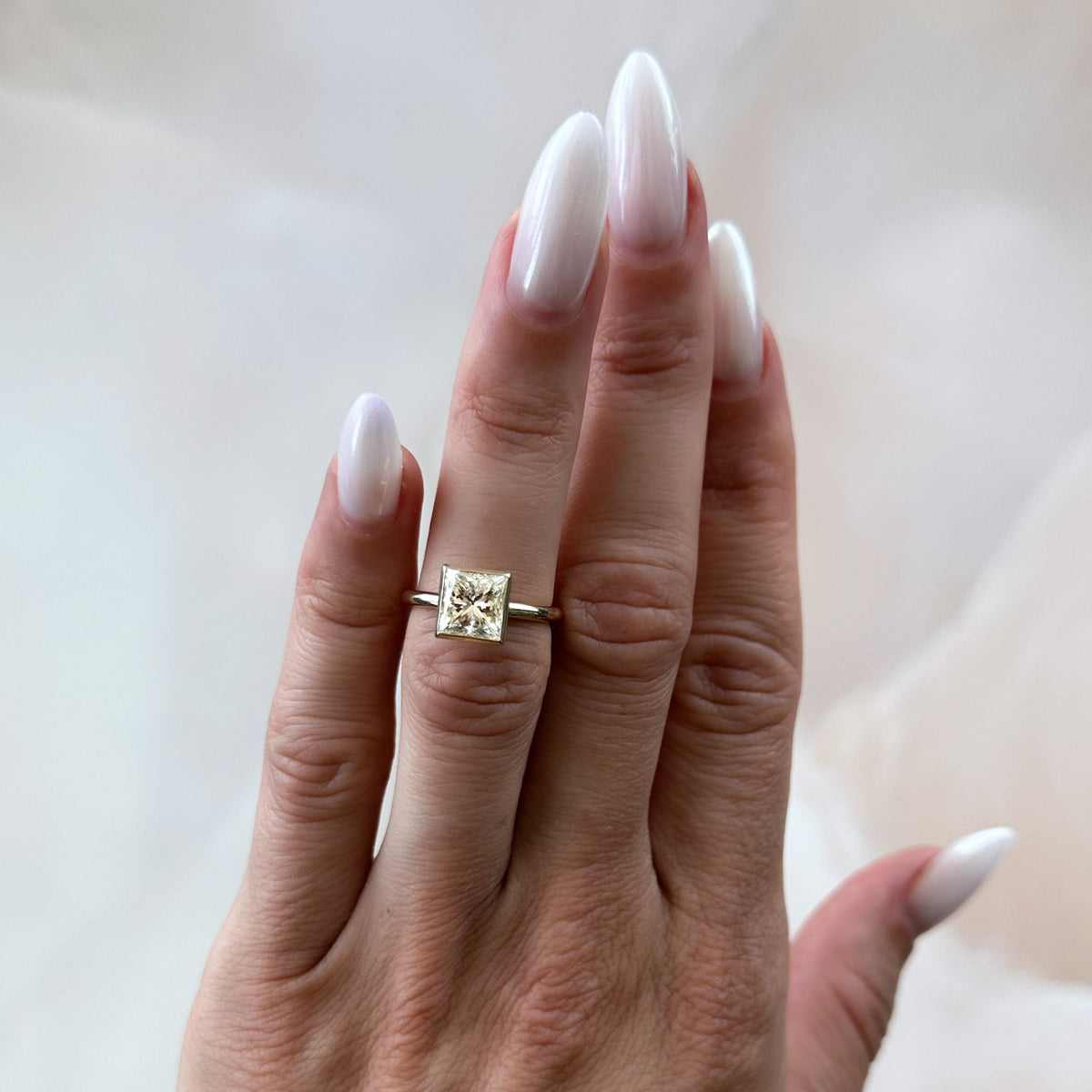 Penumbra Bezel Set Engagement Ring With Princess Cut