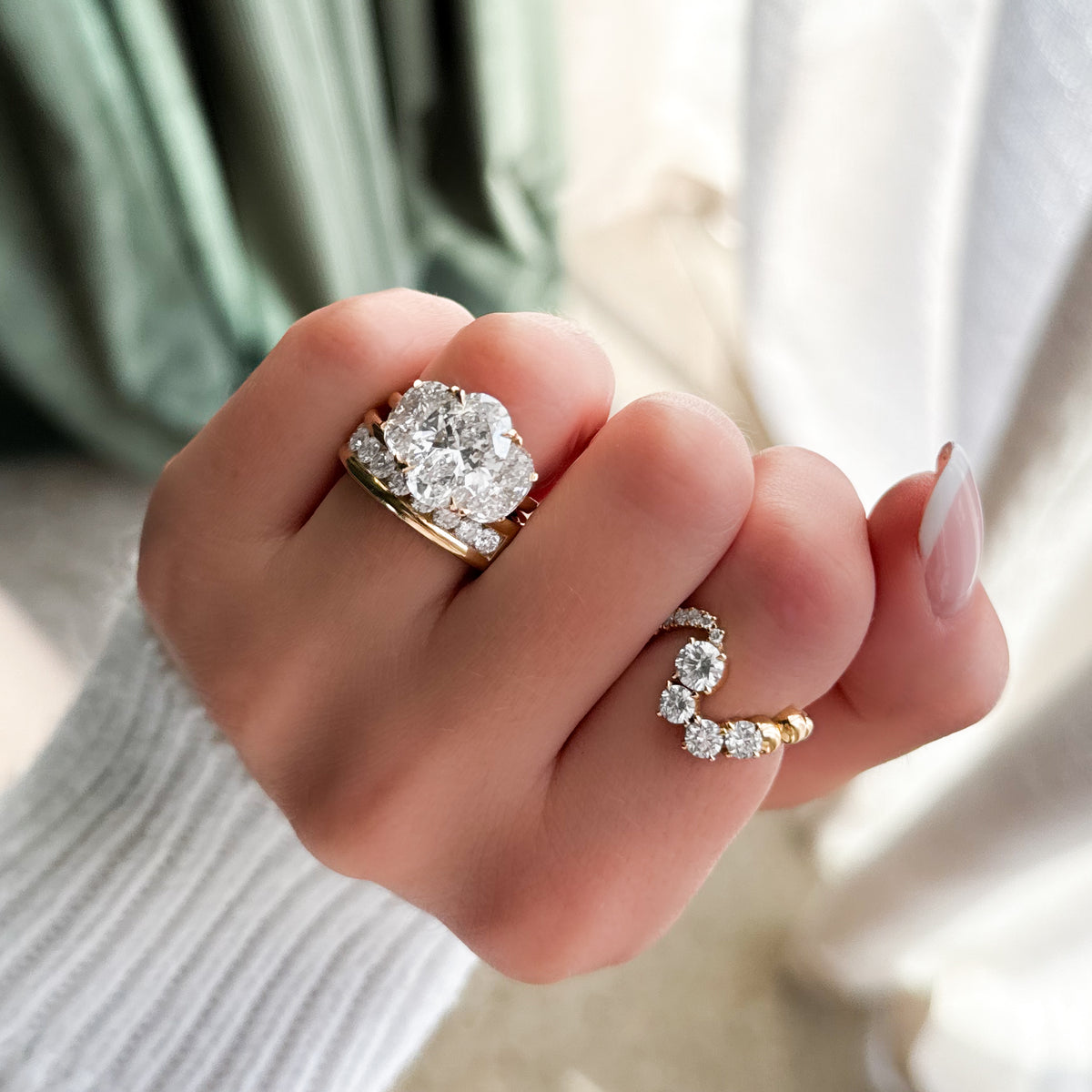 Jumbo Three Stone ring with Half Moon sides & an Oval Cut