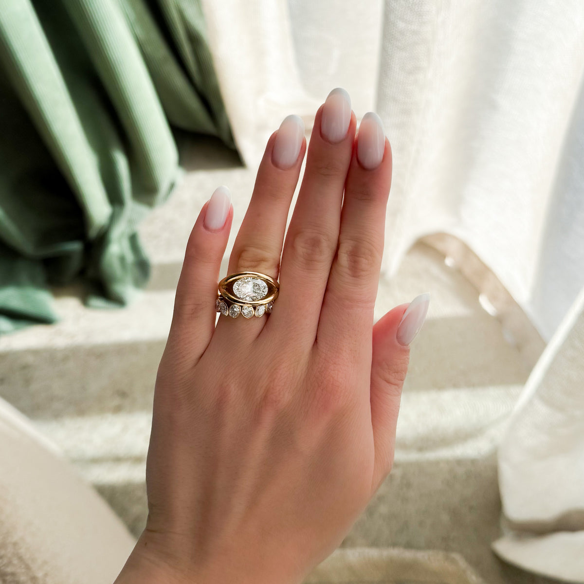 Iris Engagement Ring With an Oval Cut Diamond