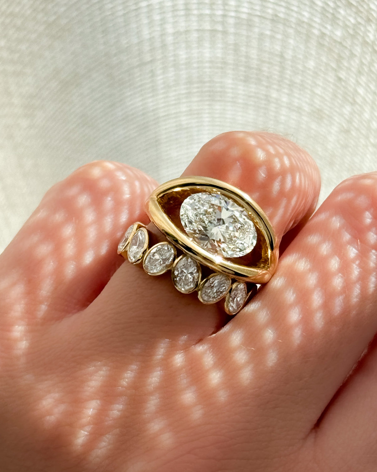 Iris Engagement Ring With an Oval Cut Diamond