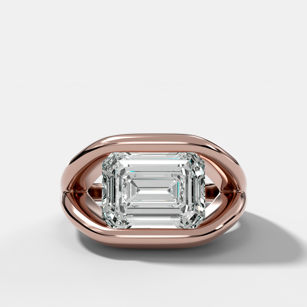 Iris Engagement Ring With East West Emerald Cut Diamond