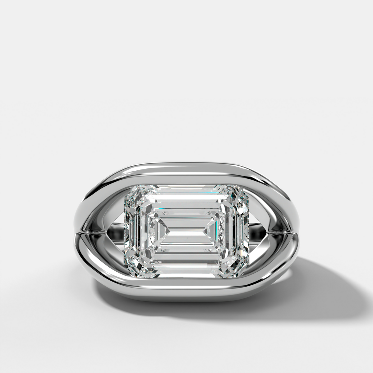 Iris Engagement Ring With East West Emerald Cut Diamond