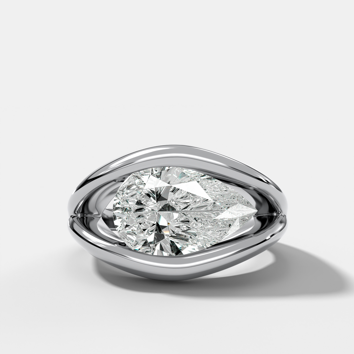 Iris Engagement Ring With a Pear Cut Diamond
