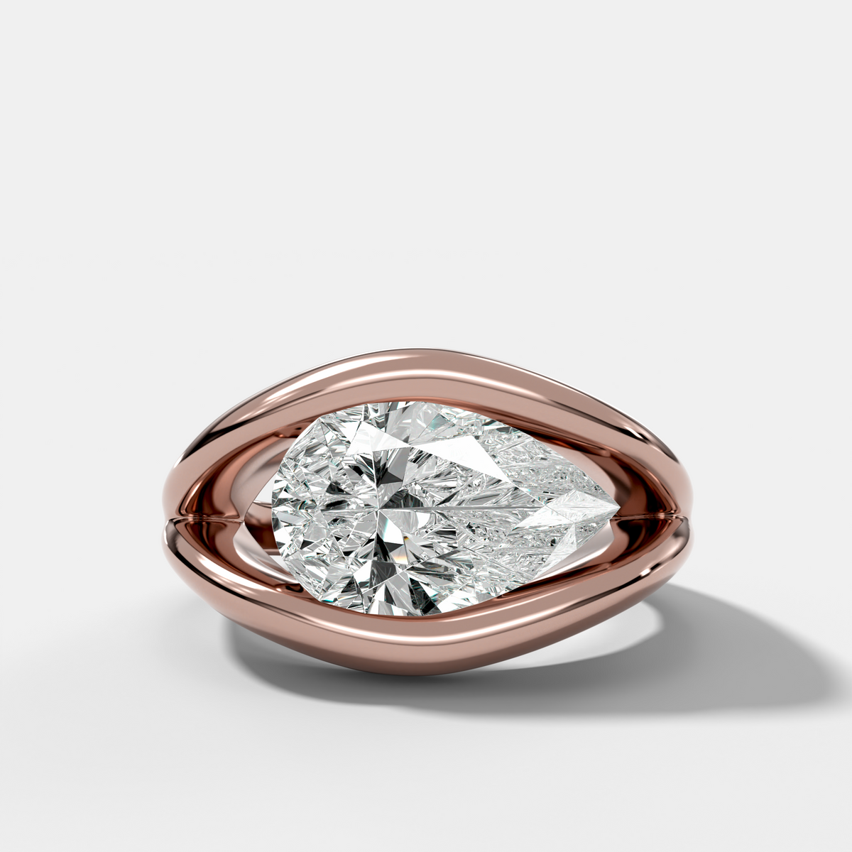 Iris Engagement Ring With a Pear Cut Diamond