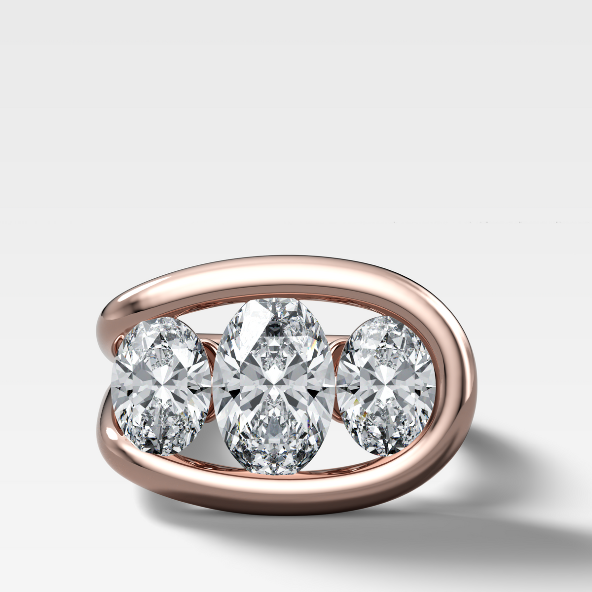Lasso Triad Engagement Ring With Oval Cut Diamonds