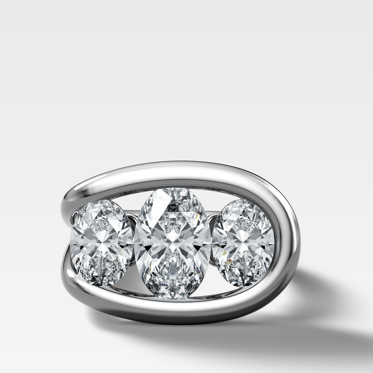 Lasso Triad Engagement Ring With Oval Cut Diamonds