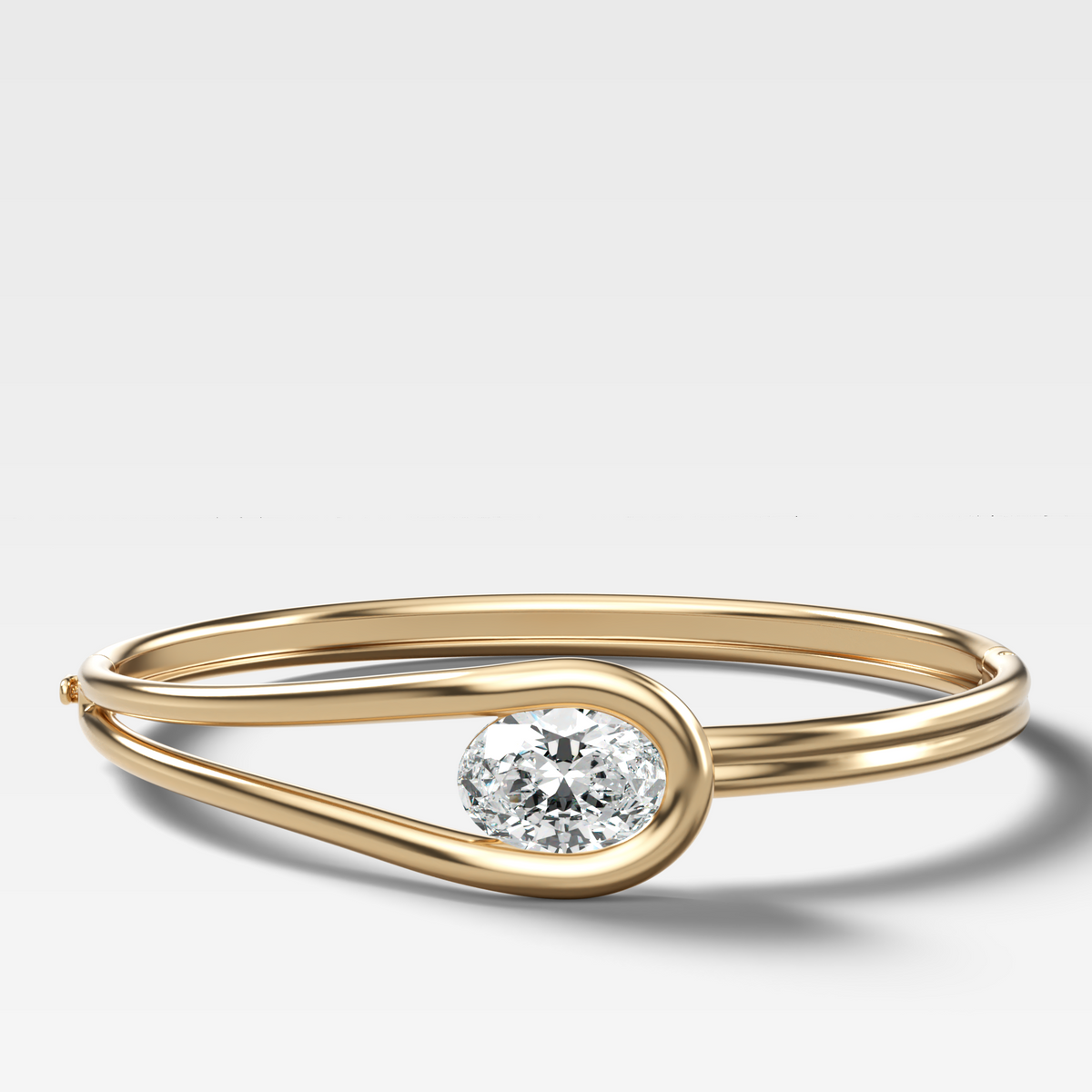 Lasso Bangle with East West Oval Cut Diamond