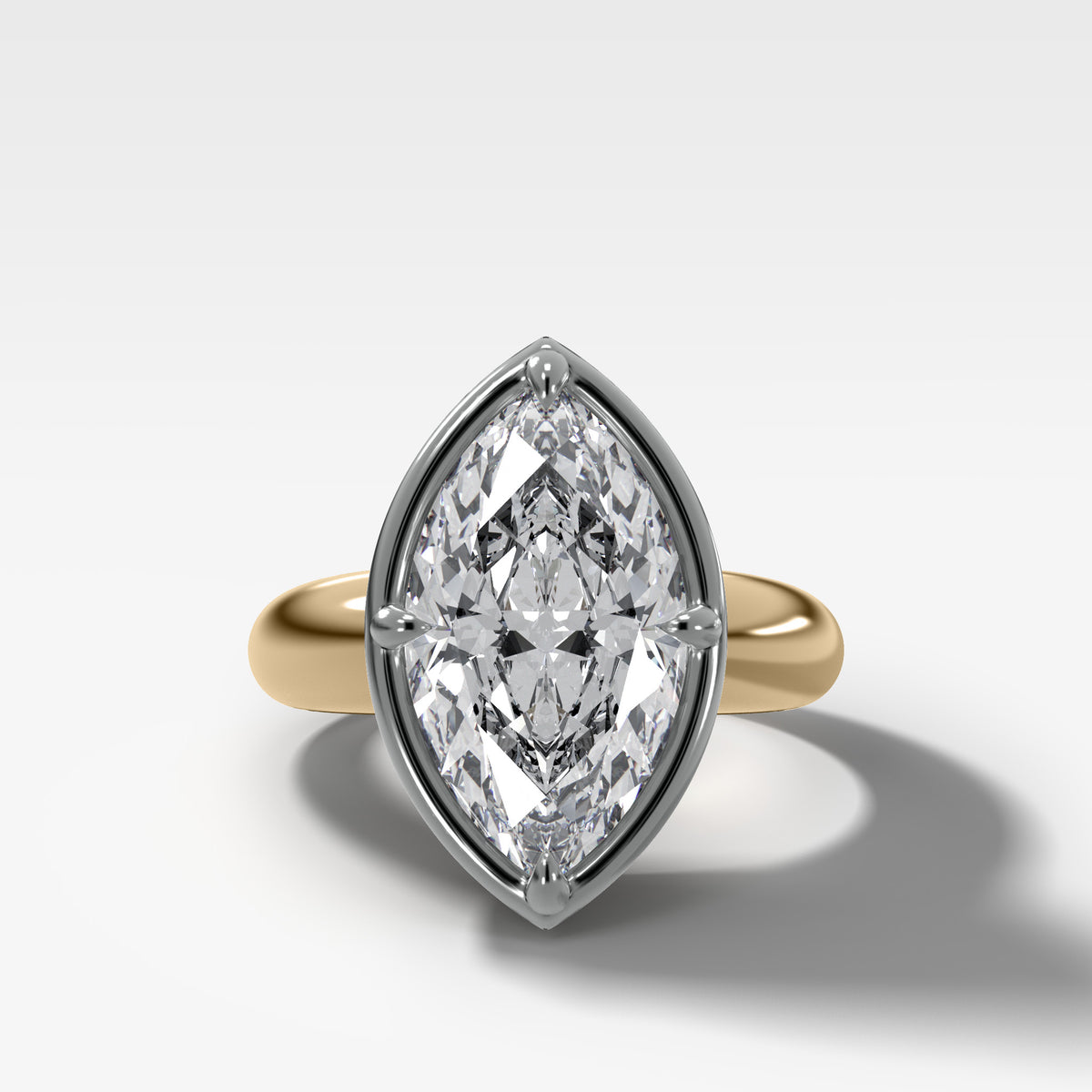 Mixed Metal Club Ring Solitaire Engagement Ring With a Marquise Cut Diamond