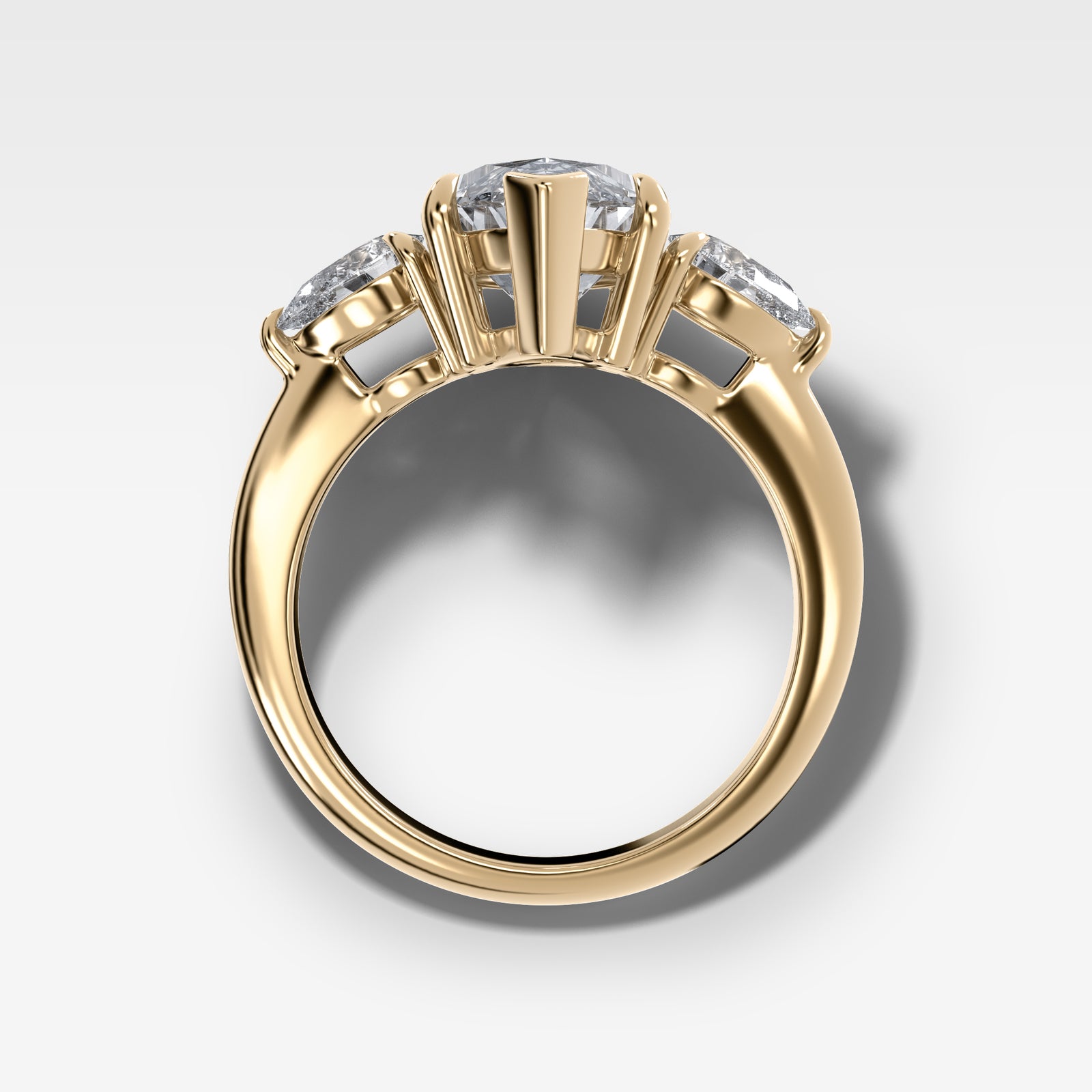 Three Stone Engagement Ring With Pear Side Stones and Marquise Cut by Good Stone in Yellow Gold