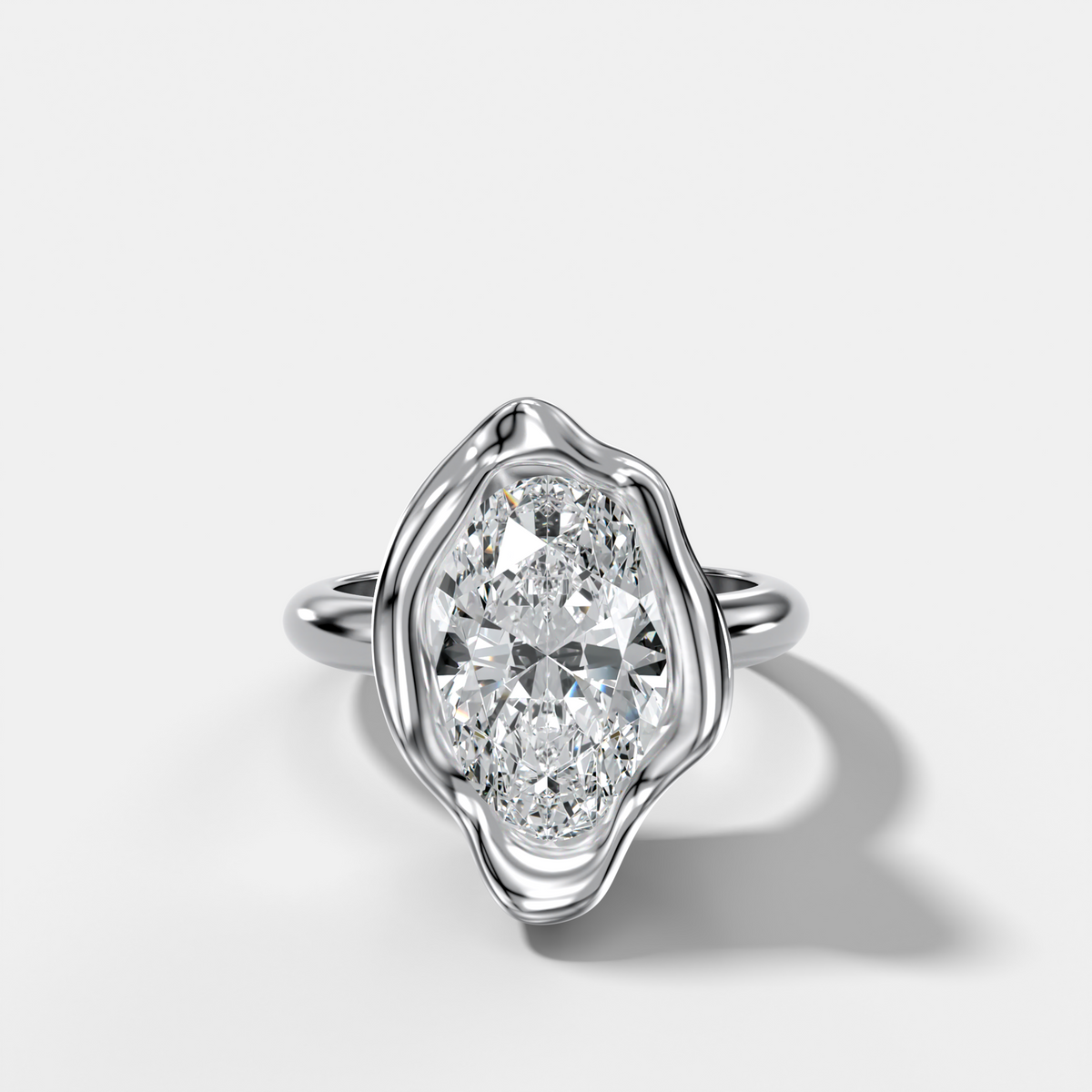 Molten Bezel Engagement Ring With an Oval Cut Diamond