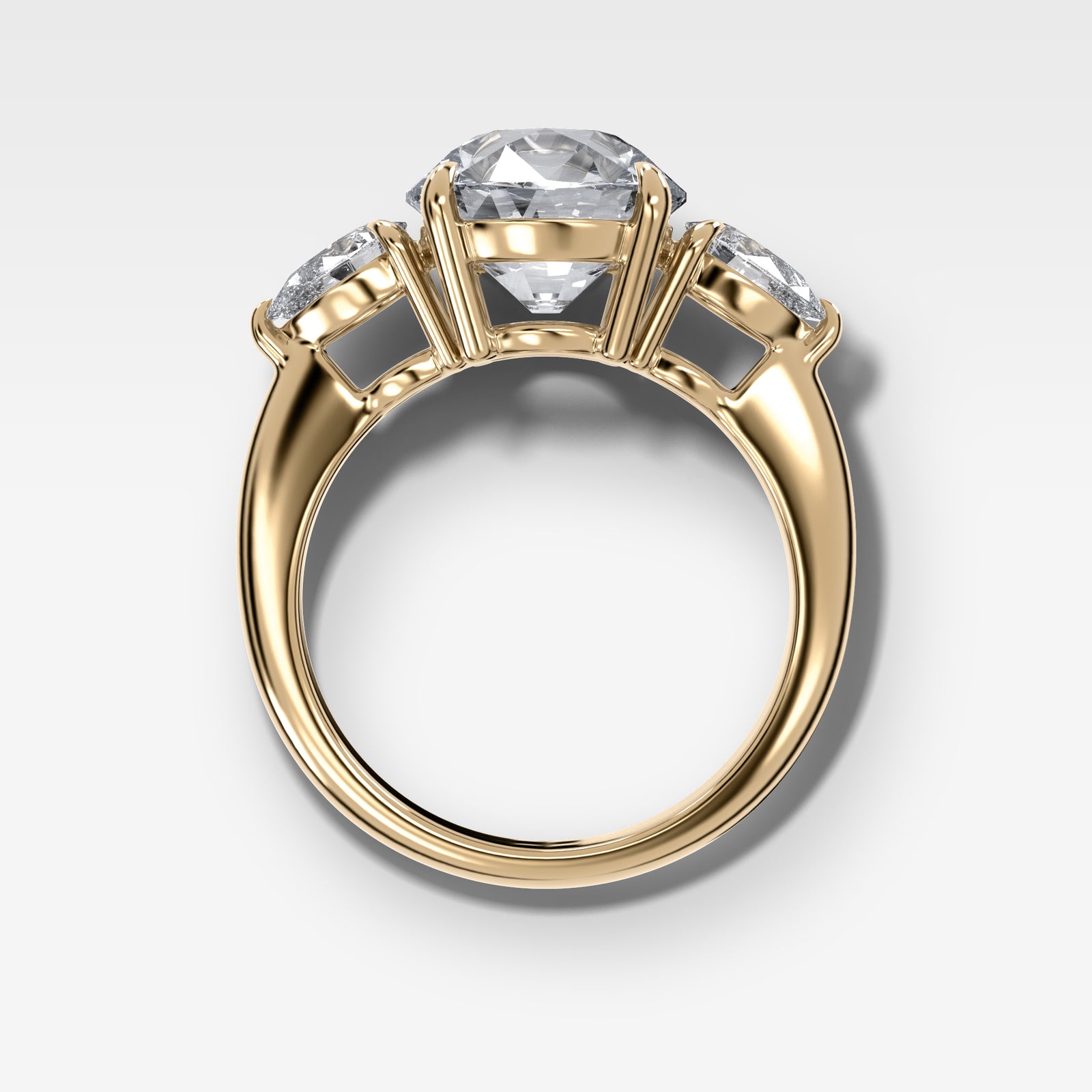 Three Stone Engagement Ring With Pear Side Stones and Old Euro Cut by Good Stone in Yellow Gold