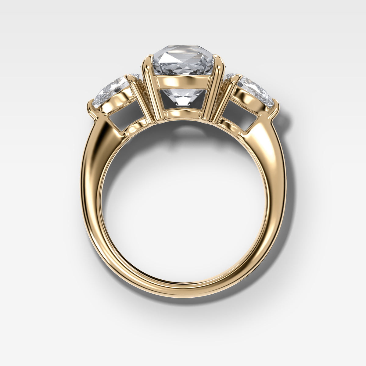 Three Stone Engagement Ring With Pear Side Stones and Old Mine Cut Diamond