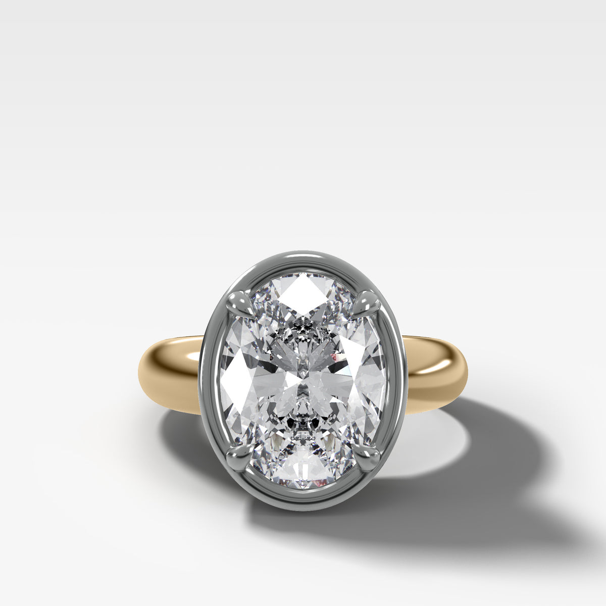 Mixed Metal Club Ring Solitaire Engagement Ring With an Oval Cut Diamond