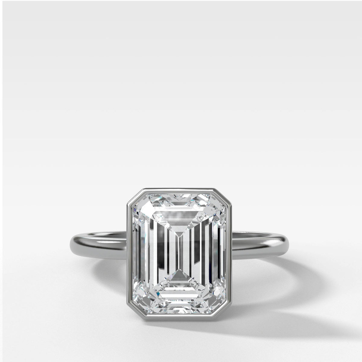 Penumbra Bezel Set Engagement Ring with 1.02ct Lab Grown Emerald Cut Diamond