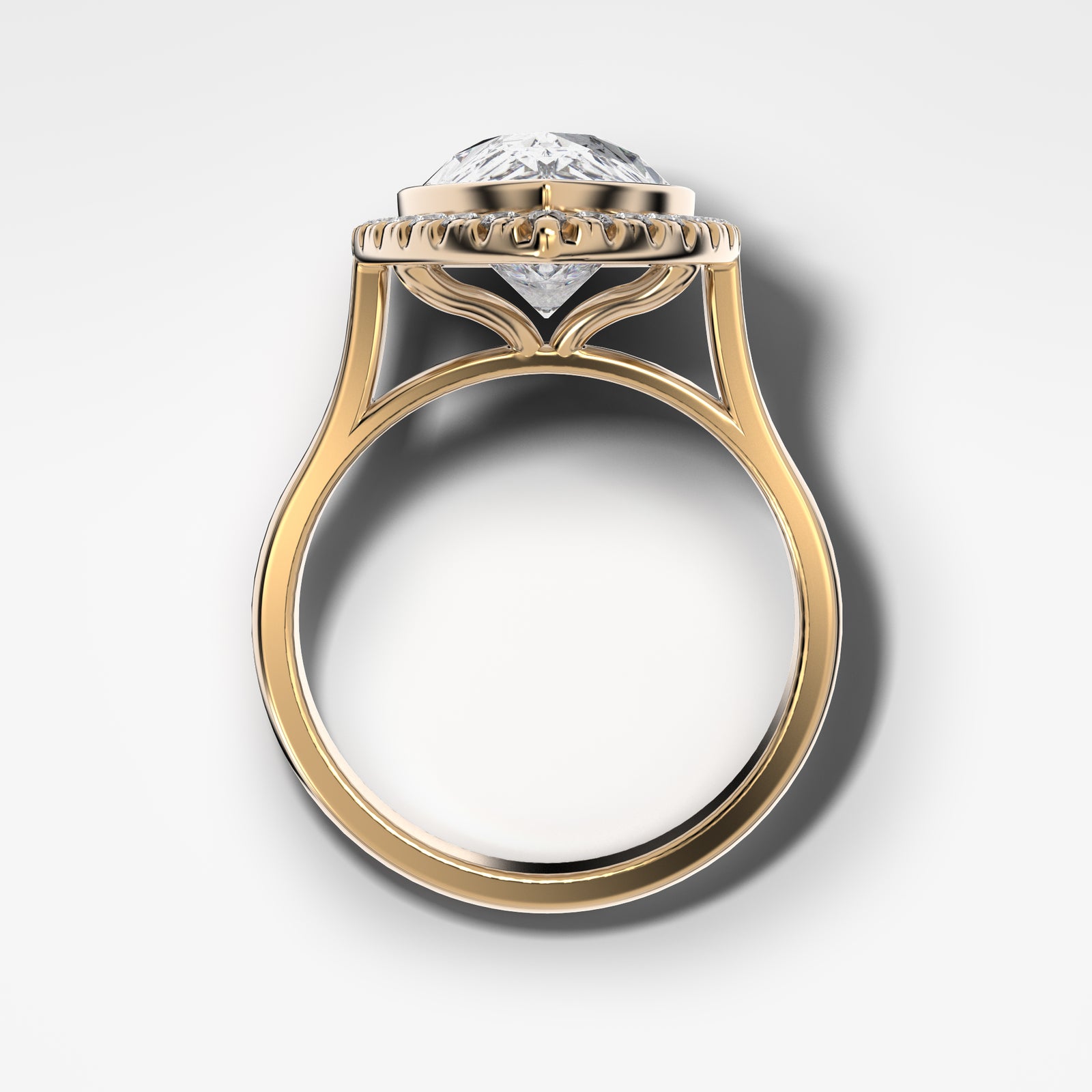 Bezel Set Halo Engagement Ring With Pear Cut by Good Stone in Yellow Gold