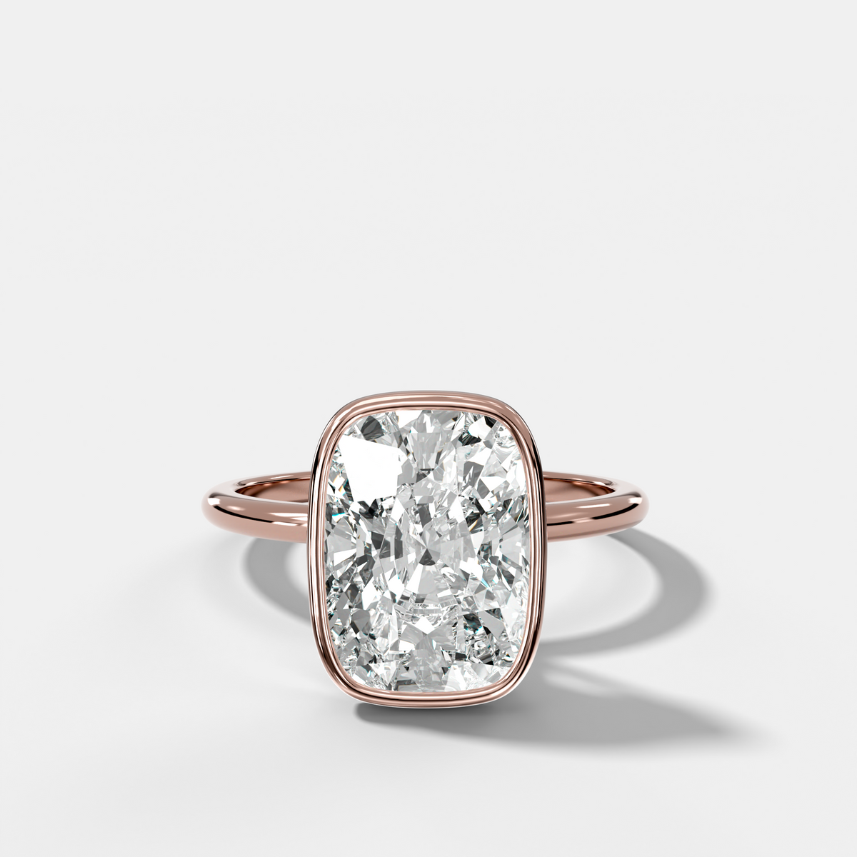 Penumbra Bezel Hidden Halo Engagement Ring with Elongated Cushion Cut