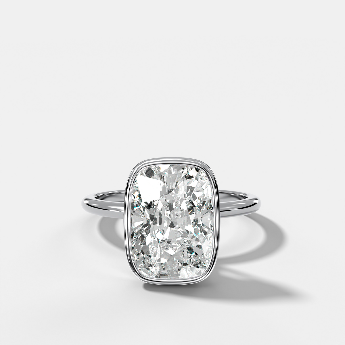 Penumbra Bezel Hidden Halo Engagement Ring with Elongated Cushion Cut