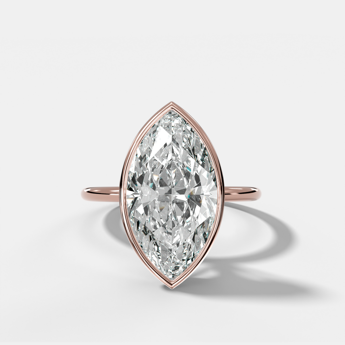 Penumbra Bezel Hidden Halo Engagement Ring with Marquise Cut