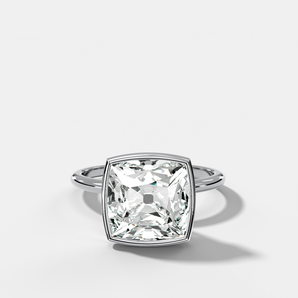 Penumbra Bezel Hidden Halo Engagement Ring with Old Mine Cut