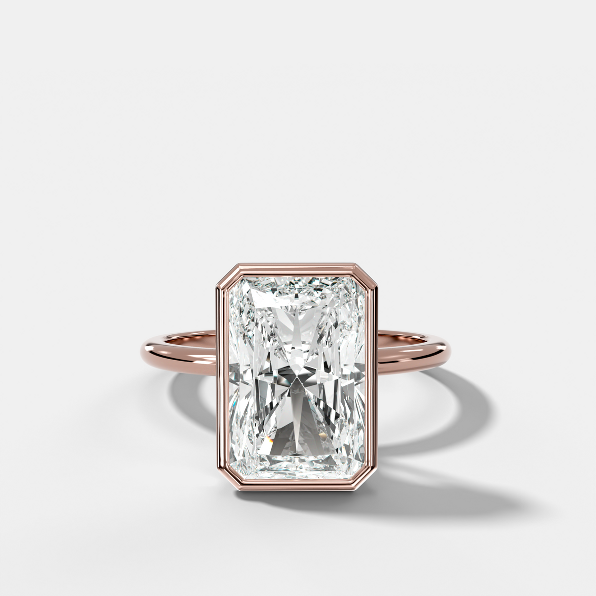 Penumbra Bezel Hidden Halo Engagement Ring with Elongated Radiant Cut